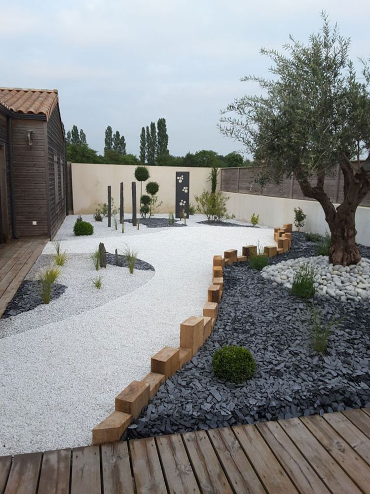 Idee per decorare un giardino moderno con i sassi n.11