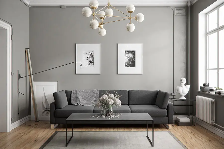 Idee per arredare il soggiorno con divano grigio scuro n.03